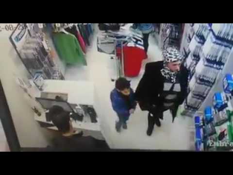 إمرأة أنيقة تستعين بطفل لسرقة محل في الجيزة