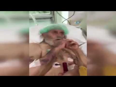 شاهد ممرضات يقدمن سيجارة لعجوز في العناية المركزة