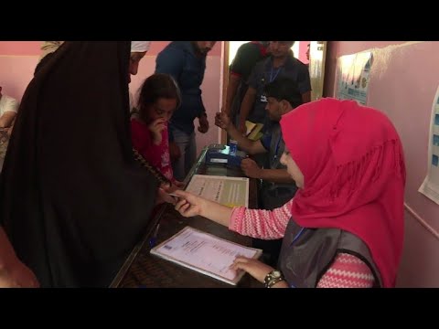 شاهد شمال العراق في ازدحام وناخبو الموصل يأملون بالأمن وإعادة الإعمار