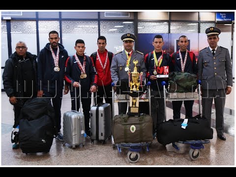 شاهد استقبال عدائي نادي الجيش الملكي لألعاب القوى في المطار