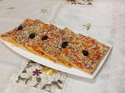 بالفيديو بيتزا سهلة وسريعة بالجبن والزيتون