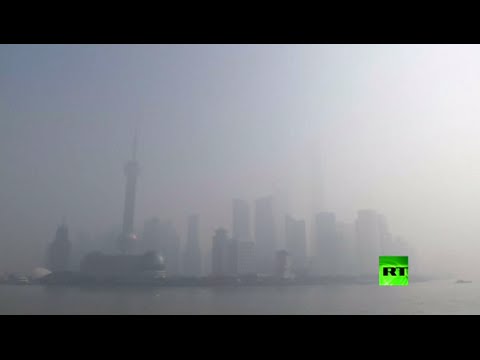 تلوث الهواء يغطي شانغهاي بضباب رصاصي كثيف